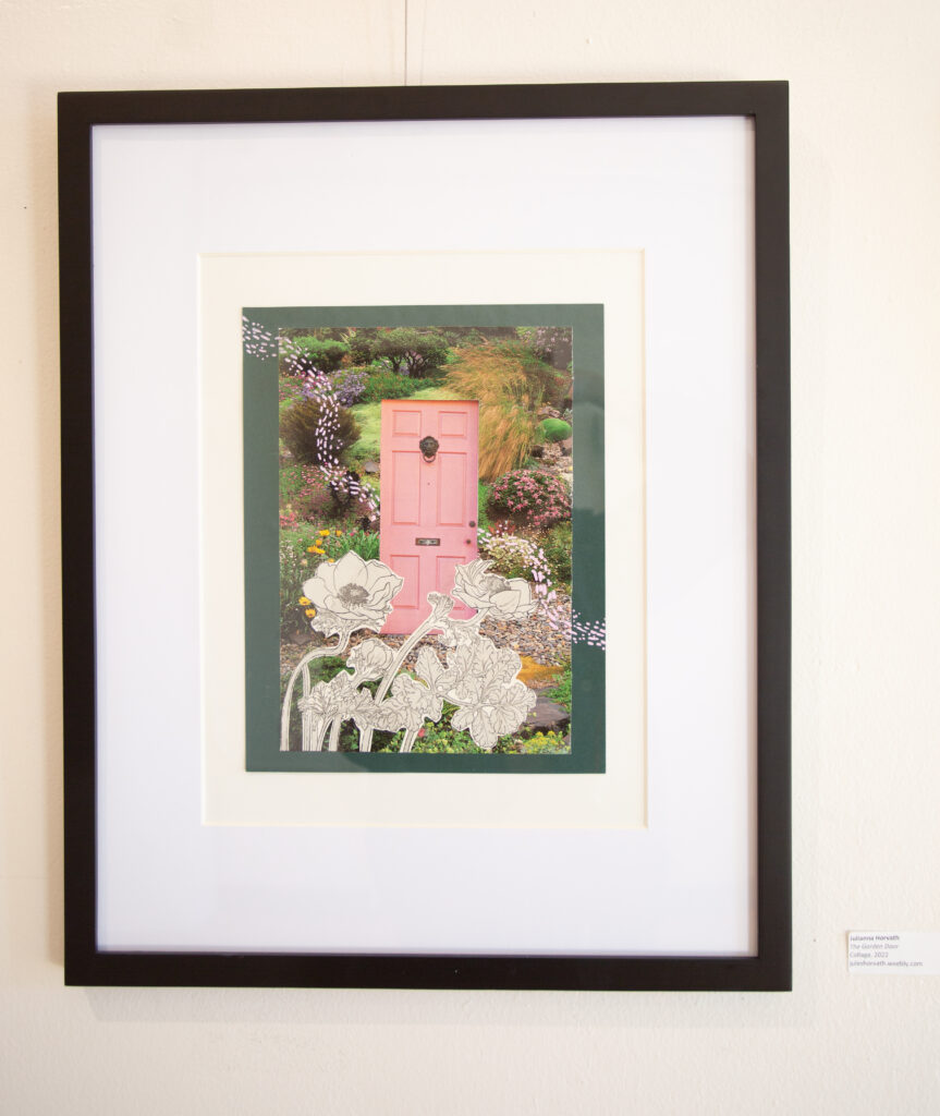 A framed collage on a gallery wall. A pink door pasted onto a picture of a garden is surrounded by hand-drawn flowers. 