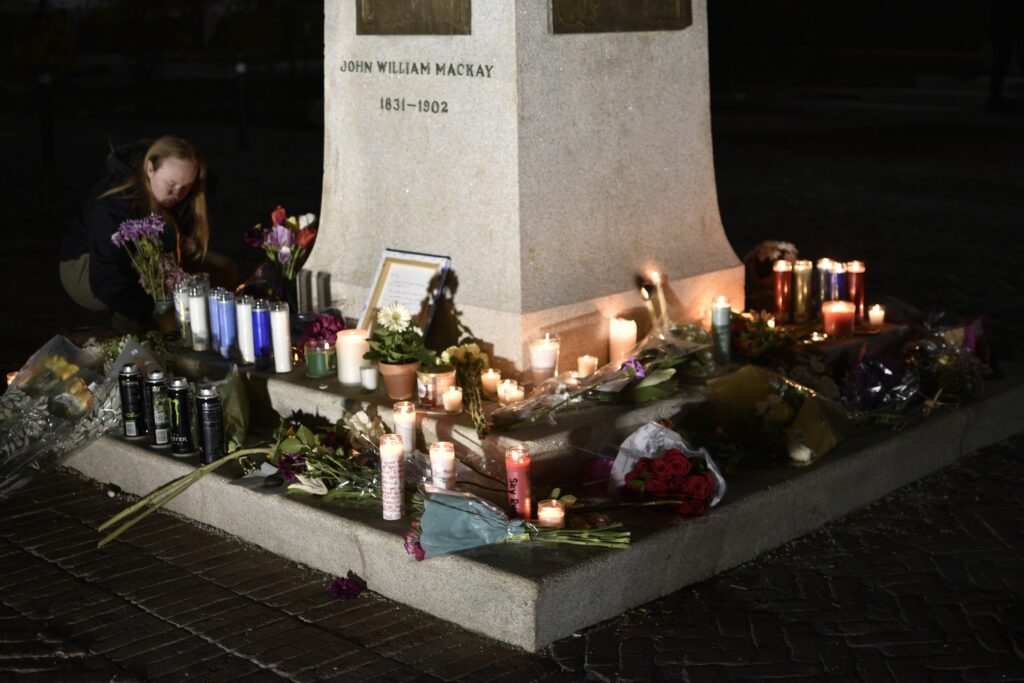 Flowers at the Mackay Statue for Sky Russell