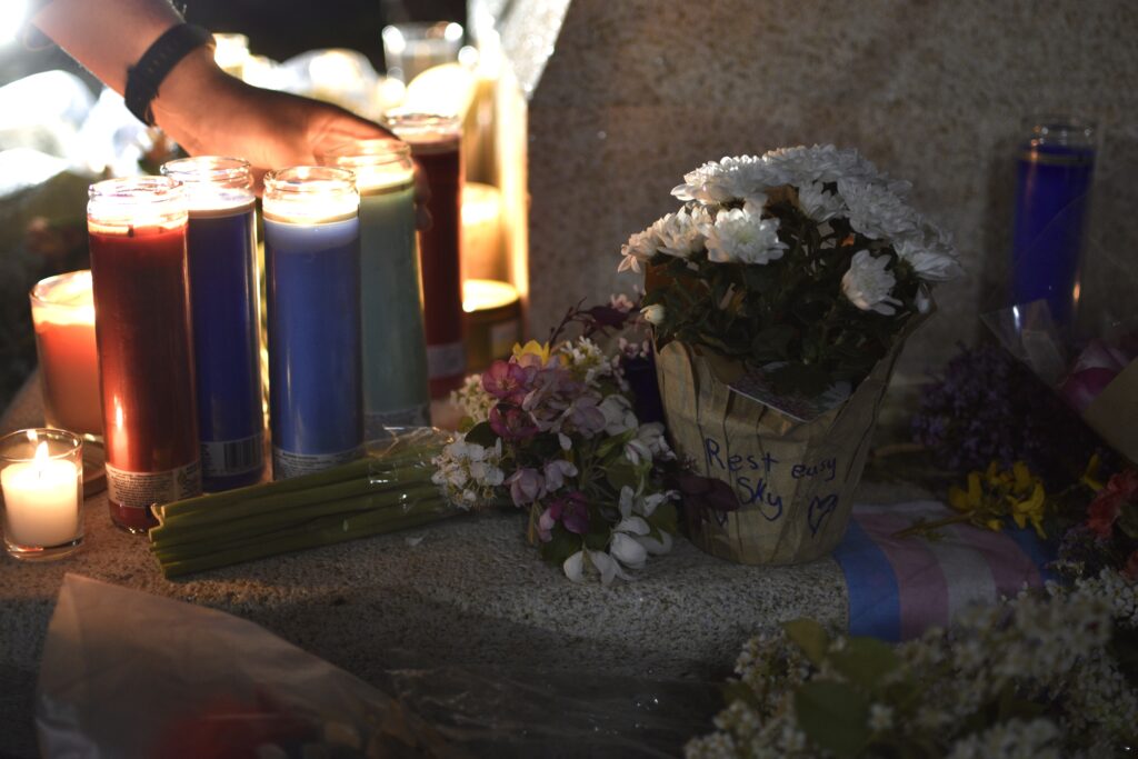 A flower pot with the words "rest easy Sky" written on the front.