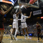 Rachel Jackson / Nevada Sagebrush Darrion Williams and Kenan Blackshear jump to put the ball in the basket