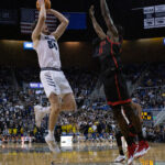 Rachel Jackson / Nevada Sagebrush Will Baker jumps to make a basket at Lawlor Events Center.