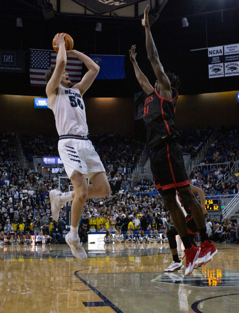 Will Baker jumps to make a basket at Lawlor Events Center.