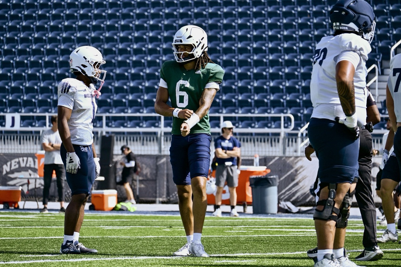 Nevada starting quarterback Carter Jones completes drills during fall camp at Mackay Stadium on Friday, Aug. 21.