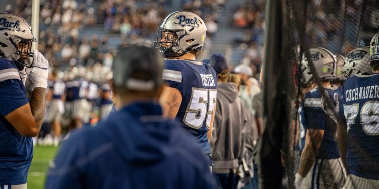 Nevada offensive tackle Jack Foster stares into the distance during a break in the action at Mackay Stadium on Saturday, Sept. 12.