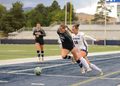 Wolf Pack forward Olivia Loomis (#16) takes on a Lumberjacks defender on Thursday, Sept. 3 at Mackay Stadium.