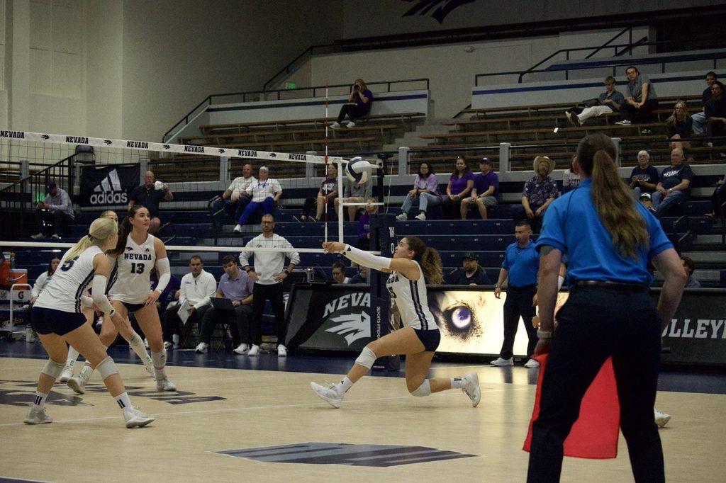 Junior defensive specialist Lara Pacheco saves the ball on Sunday Sept 13. 