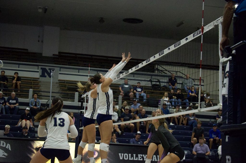 Senior middle blocker Ceren Sert and freshman outside hitter Paige Thies block Kansas
State from scoring on Sunday Sept 13. 