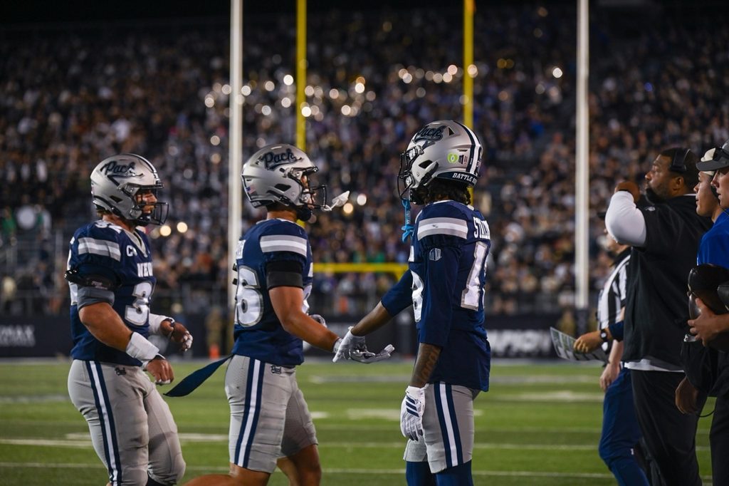 Nevada defensive back Tajean Stallworth greets teammates returning to the sideline at Mackay Stadium on Saturday, Sept. 12.