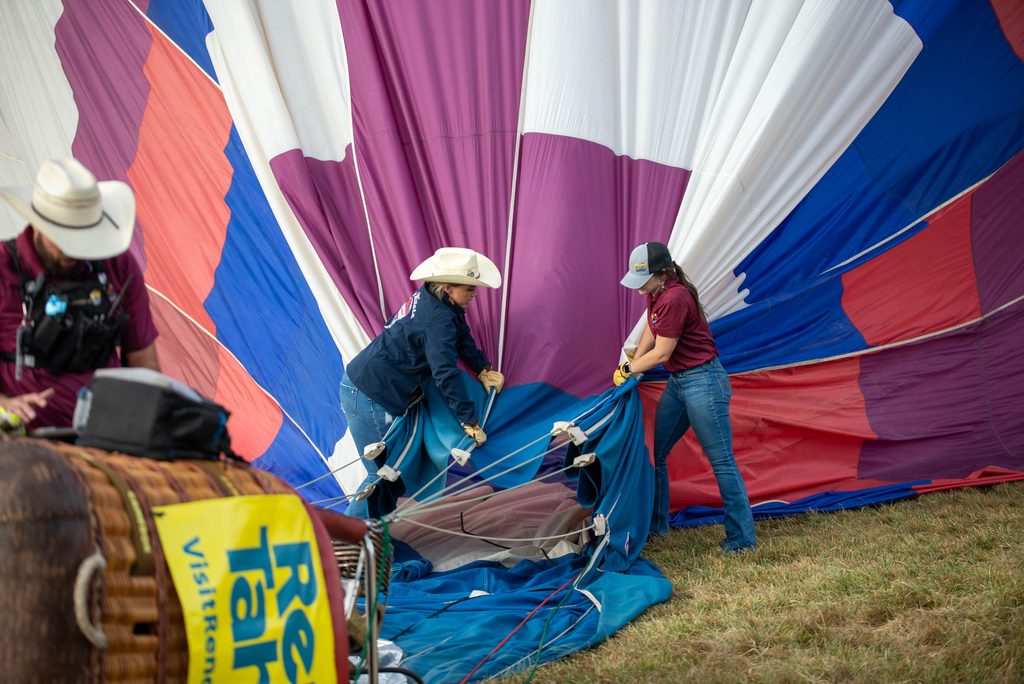 The crew of the Hot Minute balloon, captained by Tristan Maclean, get set to take off prior to the Great Reno Balloon Race on Thursday, Sept. 10.