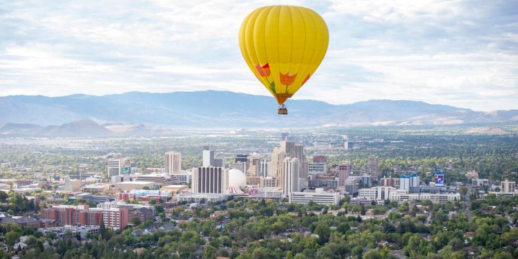Rubicon, piloted by Tim Nelson, takes the skies above the downtown Reno on Thursday, Sept. 10. (Max Alexander/The Nevada Sagebrush)