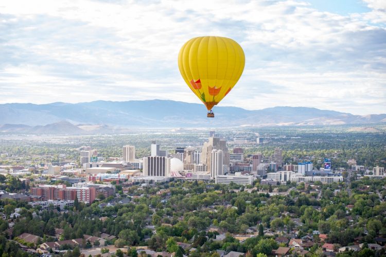 Rubicon, piloted by Tim Nelson, takes the skies above the downtown Reno on Thursday, Sept. 10.