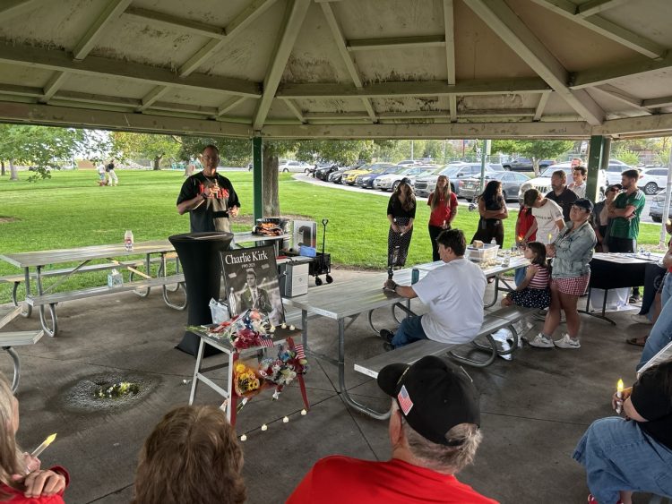 Local Pastor Craig Dyson started the vigil with a prayer at Dick Taylor Memorial Park on Thursday, Sept. 10.
