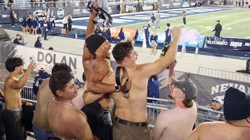 Fans in the student section cheer excitedly during the Nevada Football Home Opener on Saturday, Sep. 5.