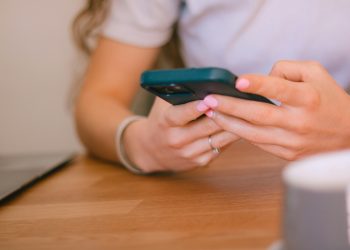A girl is texting on her phone