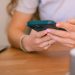 A girl is texting on her phone