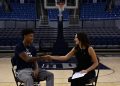 Nevada basketball junior guard TJ Coulter shakes hands with Nevada Sagebrush reporter Sophia Domingo during an interview.