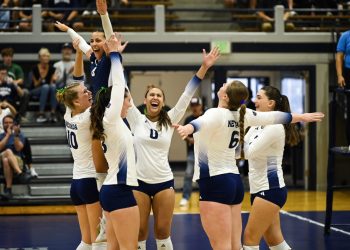 Nevada volleyball celebrates scoring a point against the Miners at Virginia Street Gym on Thursday, Oct.8.