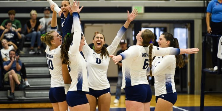 Nevada volleyball celebrates scoring a point against the Miners at Virginia Street Gym on Thursday, Oct.8.