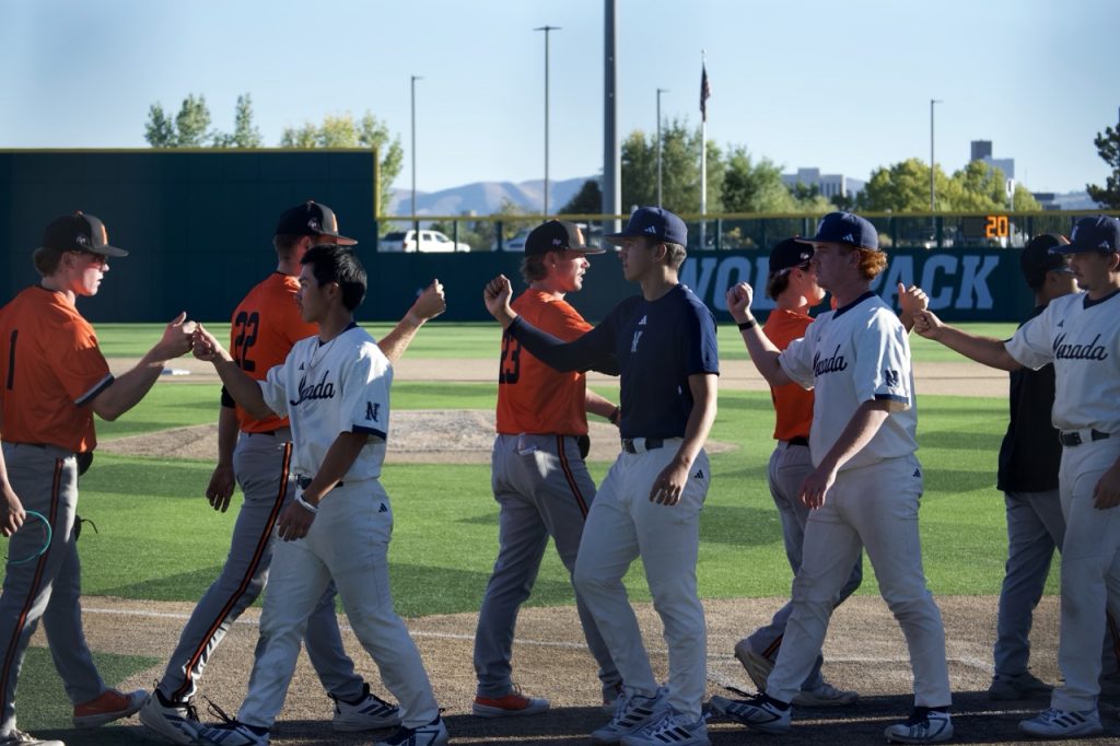 Nevada and Pacific players line up to greet each other after their matchup on Saturday, Oct. 17.