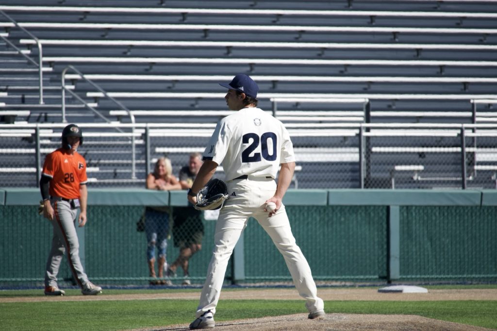 Nevada pitcher (#20) eyes the batter waiting for the pitch call on Saturday, Oct. 17.