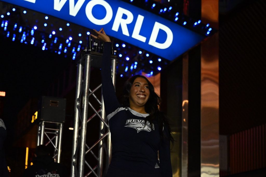 Senior pom, Janessa Arretche poses towards the crowd.