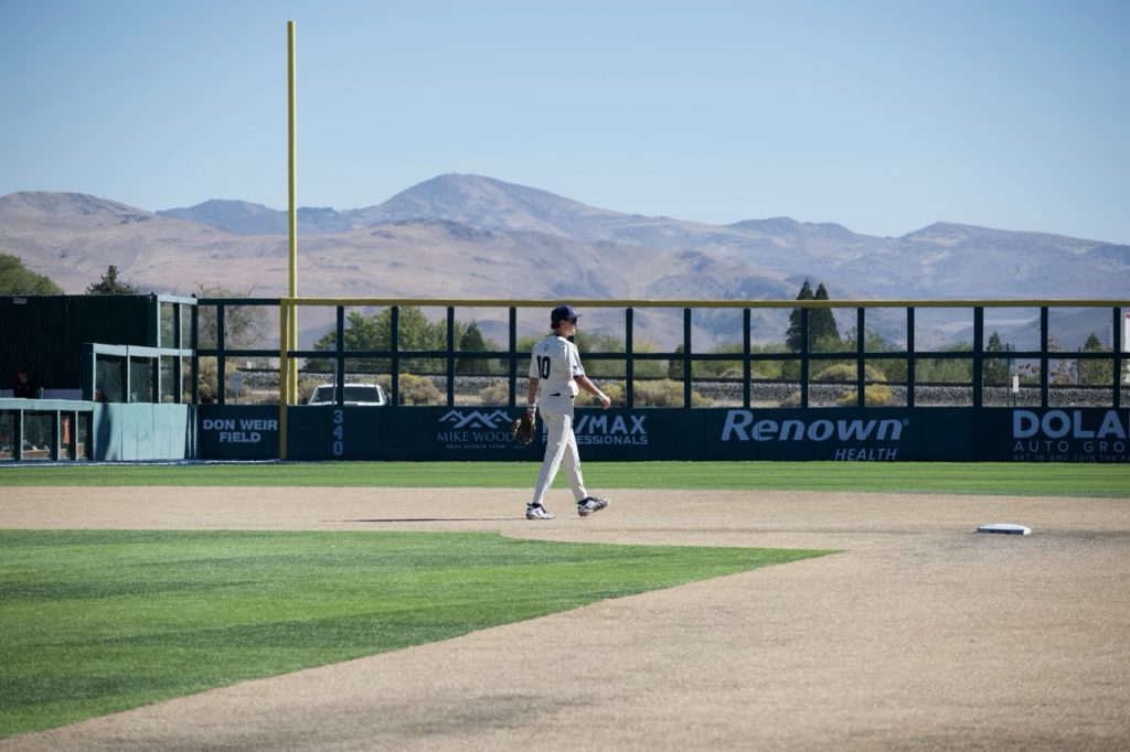 Nevada outfielder (#10) walks into the outfield on Saturday, Oct. 17.