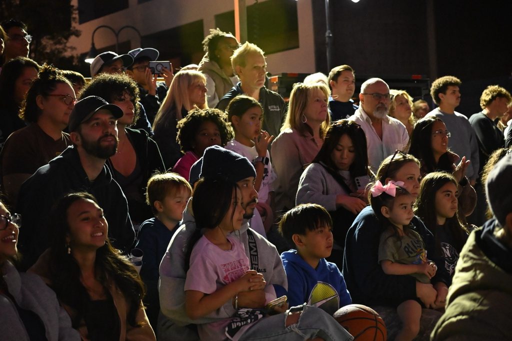Wolf Pack fans watch performances by Nevada band and Nevada Cheer.