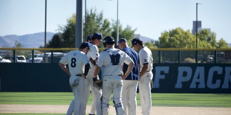 Nevada’s defense gathers at the pitching mound Saturday, Oct. 17.
