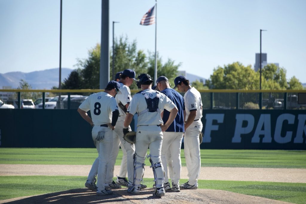 Nevada’s defense gathers at the pitching mound Saturday, Oct. 17.