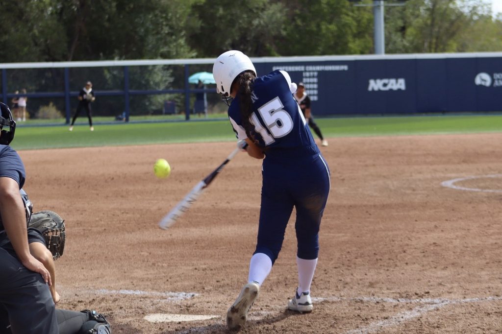 Nevada swings and makes contact with a pitch from Southern Oregon University on Sunday, Oct 4. at the Christina M. Hixson Softball Park. 