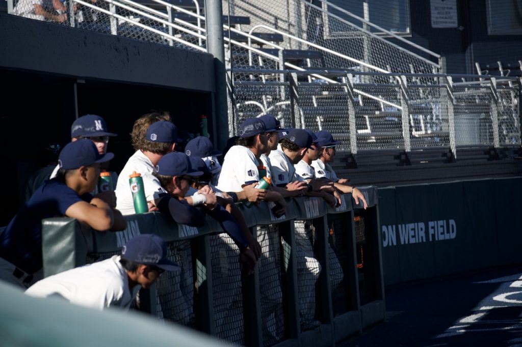 The Nevada dugout watches their teammates at-bat on Saturday, Oct. 17.