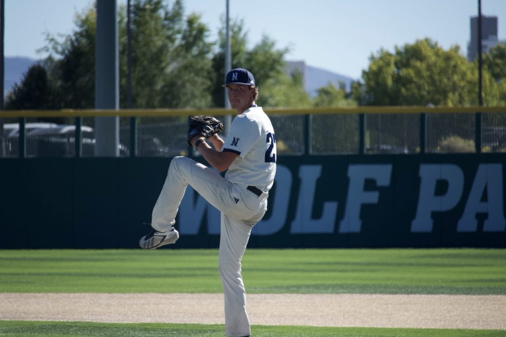 Nevada pitcher (#27) winds up to send a pitch on Saturday, Oct. 17.