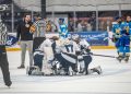 The Nevada men's hockey team gatherson the ice before the game begins on Oct. 9 at Reno Ice.