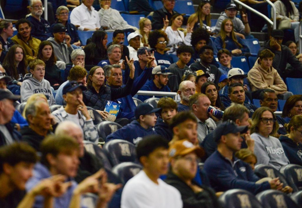 University of Nevada, Reno President Brain Sandoval sits alongside his wife, Lauralyn Sandoval, at the Nevada men's basketball exhibition game at Lawlor Event Center on Sunday, Oct. 25.