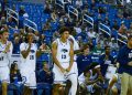 Freshman forward Kade Snyder (#13) celebrates alongside teammates, freshman guard SJ Madison (#15)and freshman forward Hudson Lucas (#11) at Lawlor Event Center on Sunday, Oct. 25.