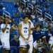 Freshman forward Kade Snyder (#13) celebrates alongside teammates, freshman guard SJ Madison (#15)and freshman forward Hudson Lucas (#11) at Lawlor Event Center on Sunday, Oct. 25.