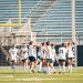 Sophomore forward Ella Hallert (#8) poses with her team after her goal on Saturday, Oct. 3.