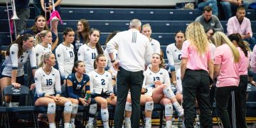 Head Coach Jason Borchin talks to his teams during a timeout.