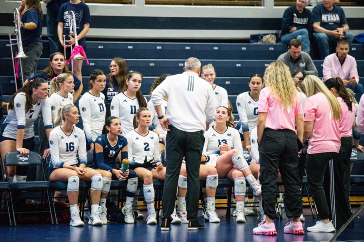 Head Coach Jason Borchin talks to his teams during a timeout.