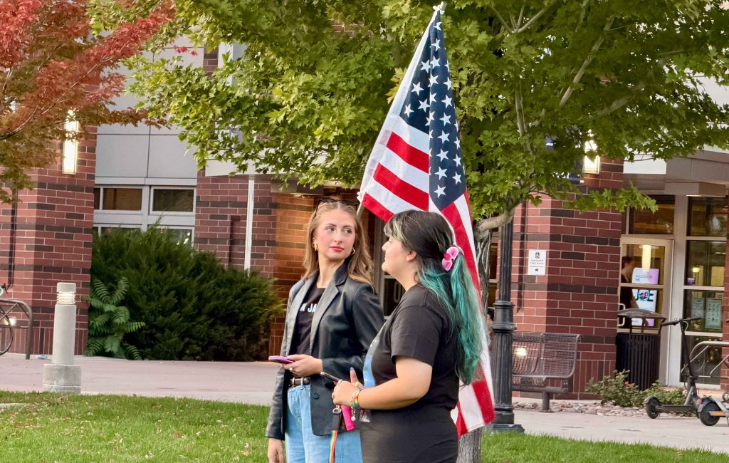 Rose Barber (left) preparing to deliver a speech on the Joe Crowley lawn alongside Sofia Silveyra Franco, co-president of NOW at UNR. 