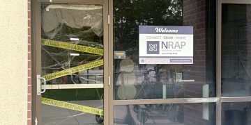 Nevada’s Recovery and Prevention Program’s (NRAP) office door decorated with cobwebs and caution tape for Halloween.