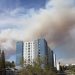 Smoke looms over a student apartment building.