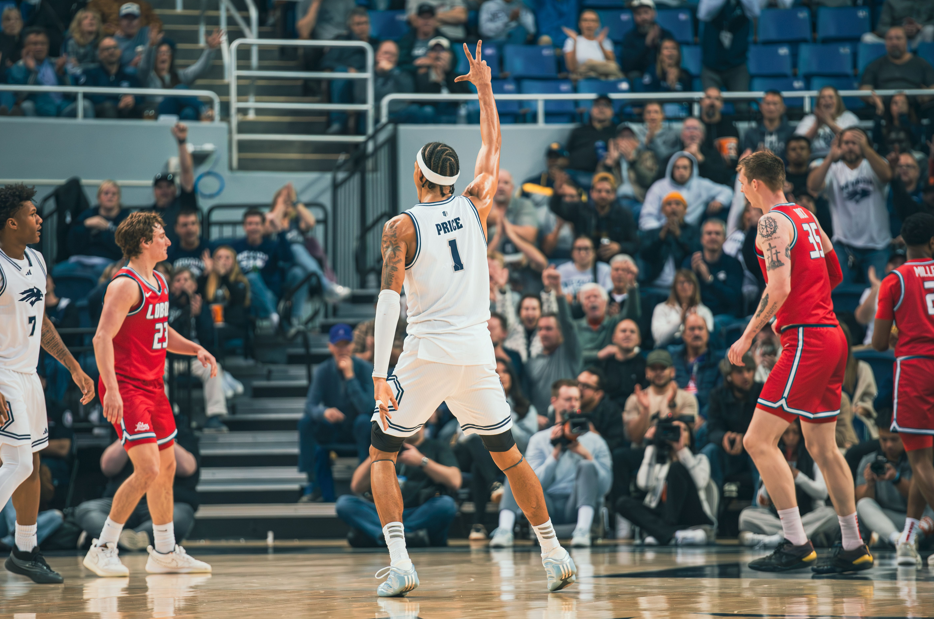 Elijah Price celebrates a three. 