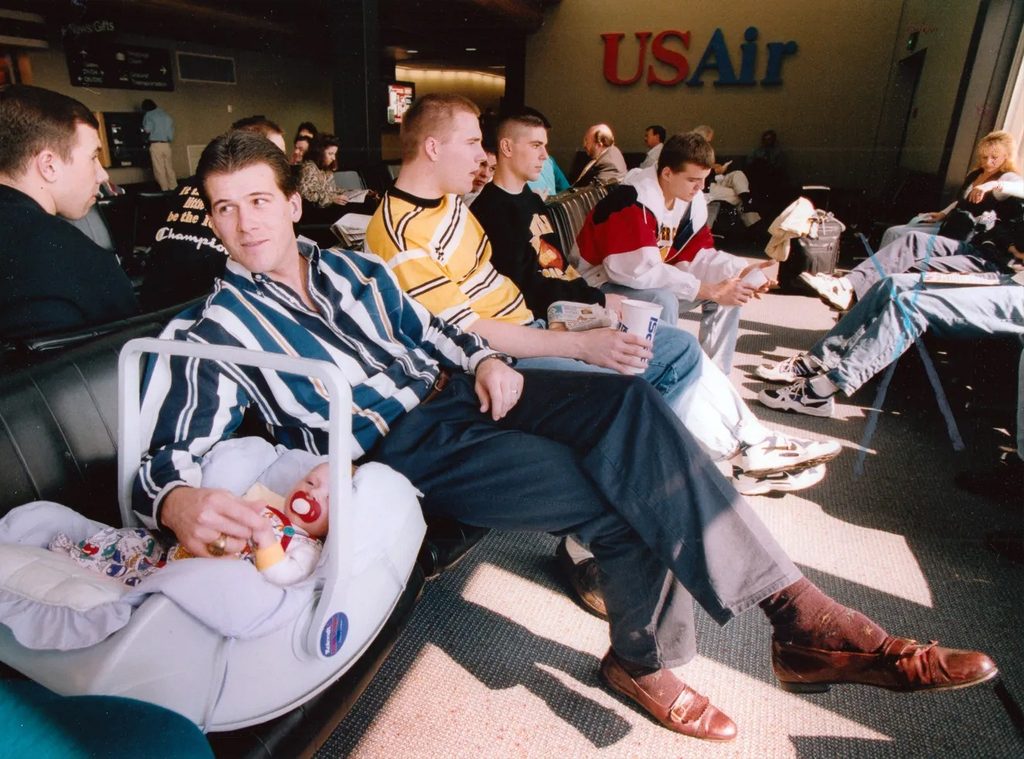 Alford with his son, Bryce, during his team’s run to the national championship game in 1995.