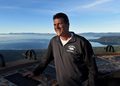 Alford standing, with Lake Tahoe in the background.