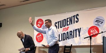 Khanna waives to the audience before starting his town hall at the University of Nevada, Reno on Friday, Oct. 23.