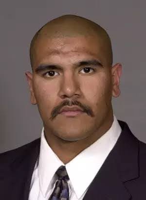 Jorge Cordova, a Nevada football player from 2000-2003, poses for his roster photo. 